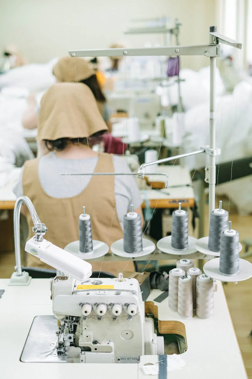 Spools of thread loaded on an industrial sewing machine — the kind Krishna Sales supplies